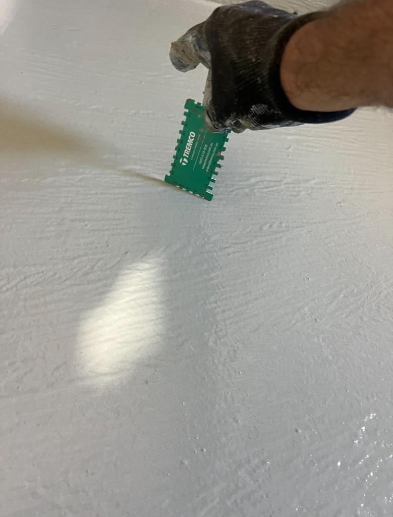 Wet film thickness gauge used to check waterproofing membrane application