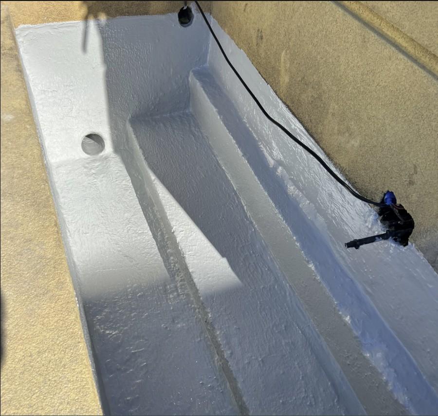 Waterproofing membrane applied to planter box floor and walls