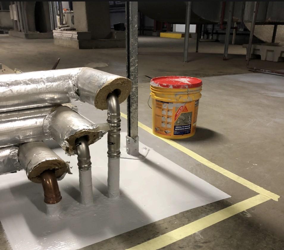 Polyurethane waterproofing membrane sealed around pipes at Prince of Wales Hospital
