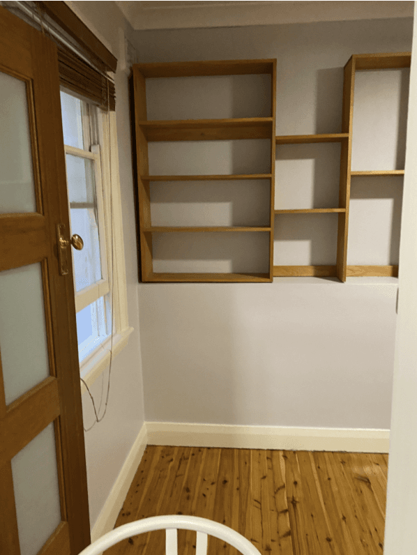 Completed room with painted walls after negative pressure membrane treatment at Barcom Ave Darlinghurst