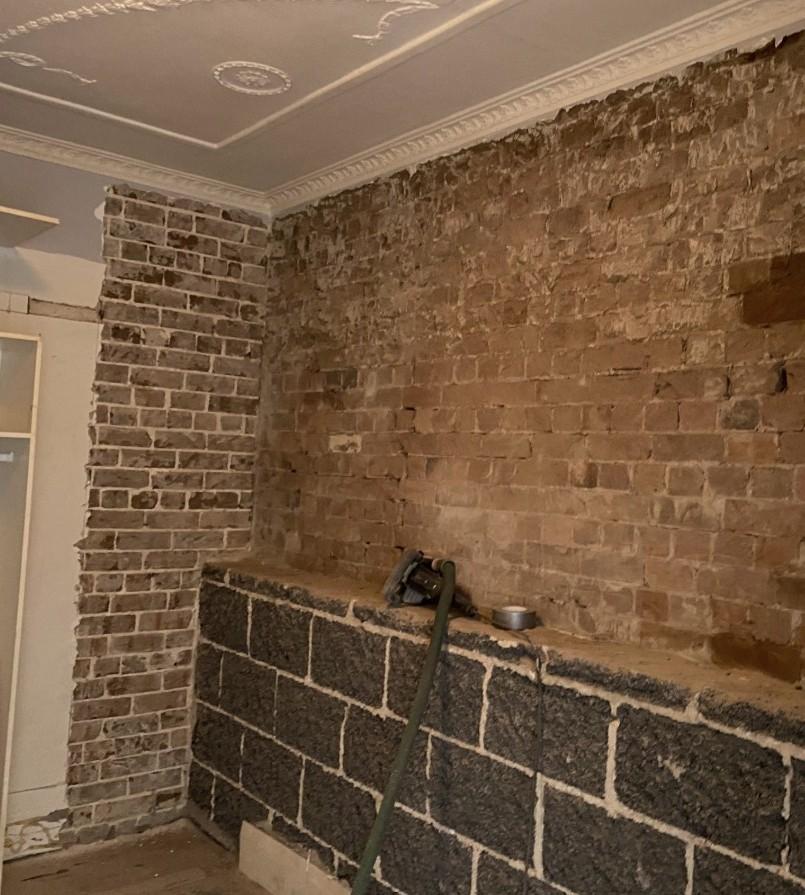 Exposed brick and blockwork during structural wall repair
