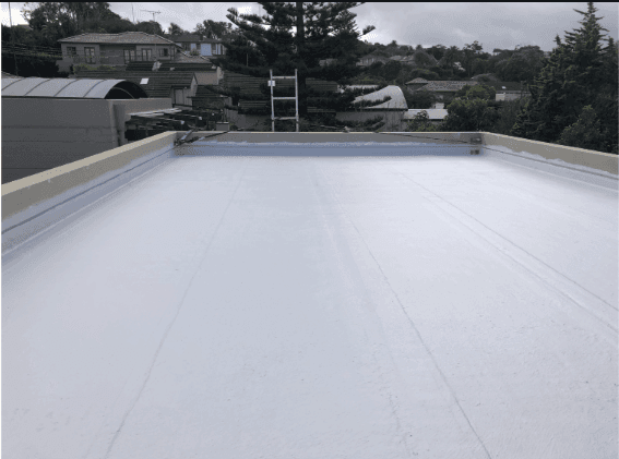 Wide view of flat roof membrane application with parapet turn-ups at Carlisle St Rose Bay