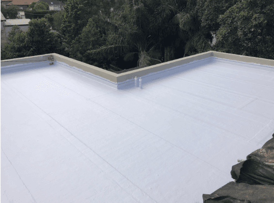 Completed flat roof waterproofing membrane with sealed penetrations at Carlisle St Rose Bay